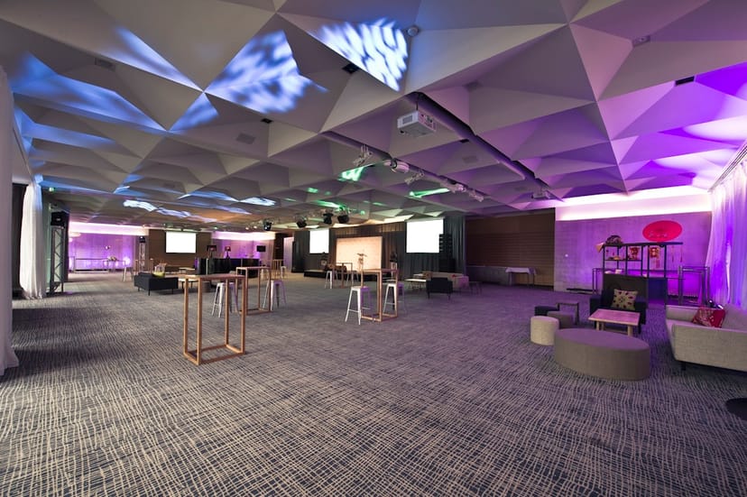 Modern ZINC Studio 1 event space with modular lounge seating for networking receptions.