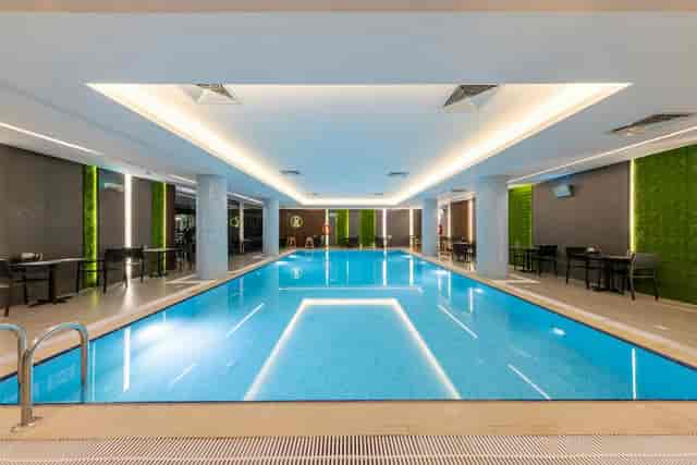 Luxury hotel poolside lobby venue for cocktail reception and experiential events.