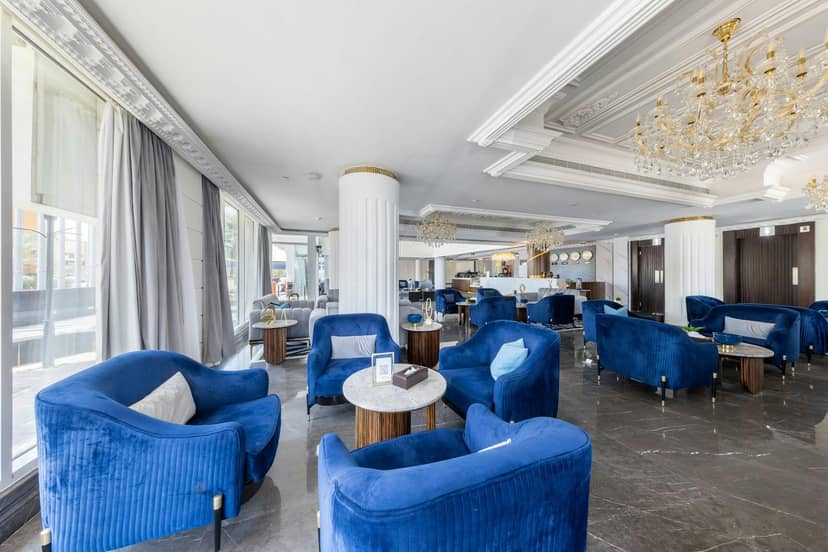 Luxury hotel lobby lounge for VIP networking and corporate event registration.