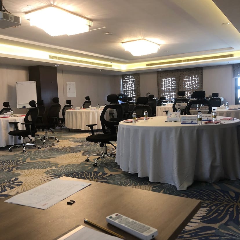 Boardroom workshop at Vittori Palace Hotel Riyadh with ergonomic chairs for corporate meetings.