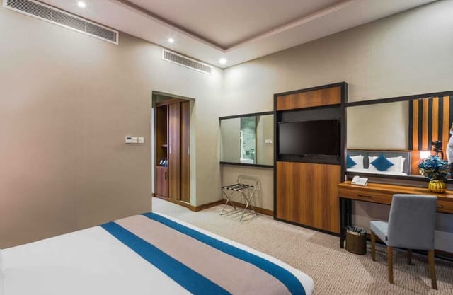 Hotel function room with dedicated workspace for business meetings and conference events.