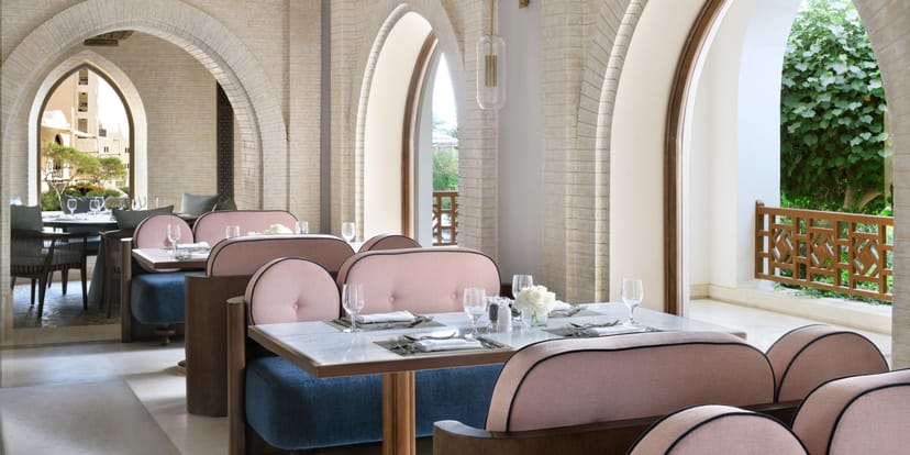 Elegant arched dining room at InterContinental Riyadh, perfect for upscale corporate networking.
