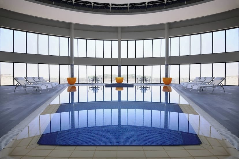 Luxurious meeting room with floor-to-ceiling windows at Courtyard Riyadh for events.