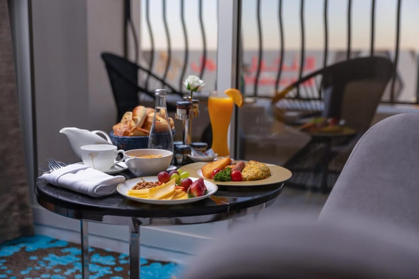 VIP hotel breakfast setup at Braira Al Nakheel Suites for executive room service dining.