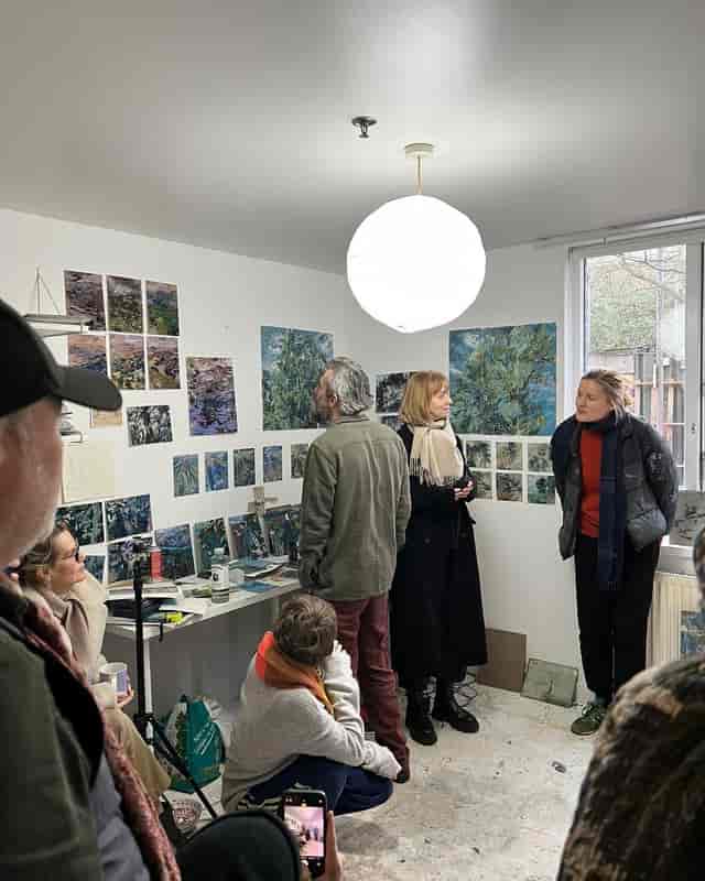 Intimate artist studio workshop, interactive gallery pop-up space for creative events.