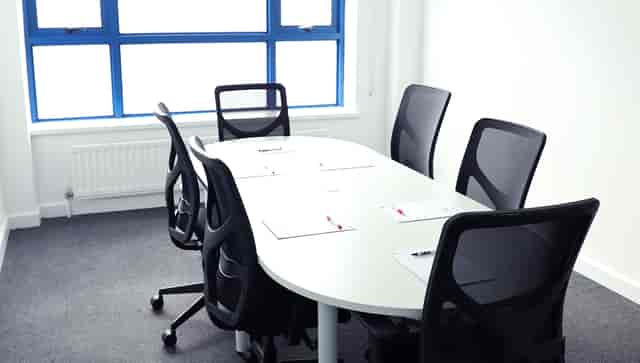 Docklands Suite boardroom with ergonomic seating for business strategy and corporate meetings.