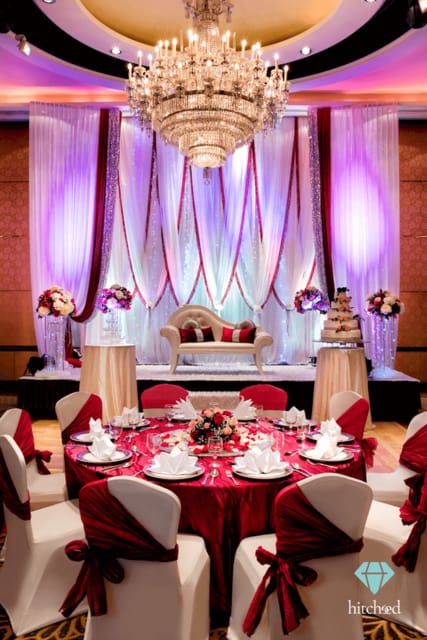 Crystal Ballroom sweetheart stage with floral decor for weddings and gala events.