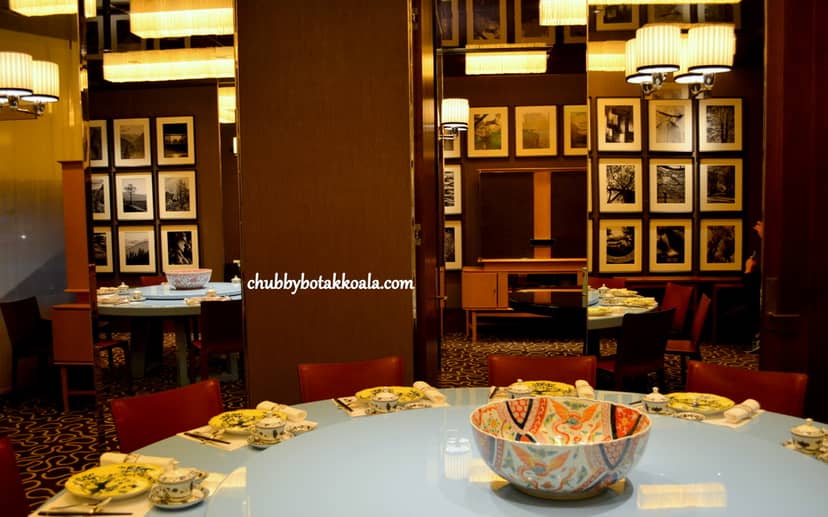 Private dining at Summer Pavilion: elegant round tables for intimate luxury events.