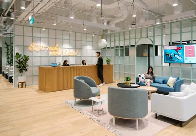 Modern office reception and networking lounge at 120 Robinson Road for corporate events.