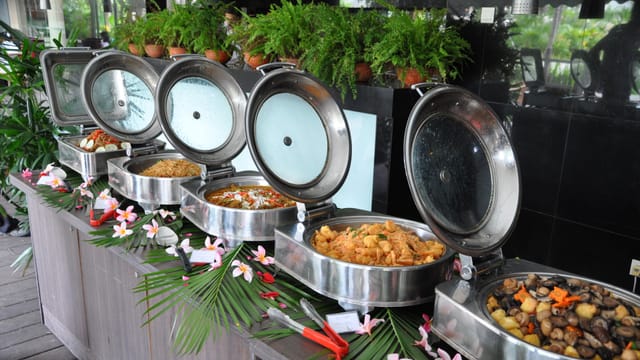 Siloso Beach Resort banquet buffet with floral decor for corporate meetings and event catering.