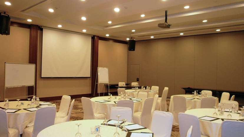 Siloso Beach Resort banquet room for corporate workshops and seminars with round table seating.