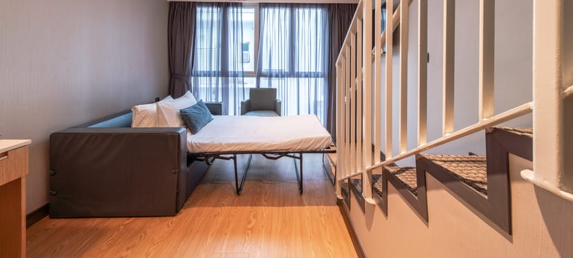 Bi-level hotel suite at Hotel Bencoolen, perfect for business travel or corporate event accommodation.