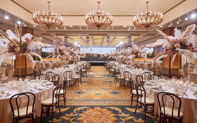 Luxury ballroom with pampas grass centerpieces for weddings and gala events in Singapore.
