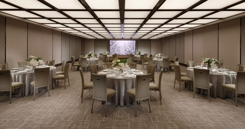 Conrad Singapore Orchard banquet hall with grid ceiling for corporate galas and breakout sessions.