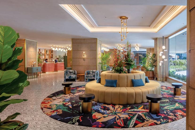 Modern hotel lobby circular lounge for corporate events and networking meetings.
