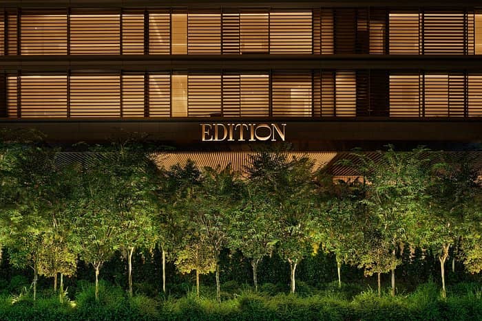 Singapore EDITION hotel exterior at night, luxury incentive trip and executive retreat venue.