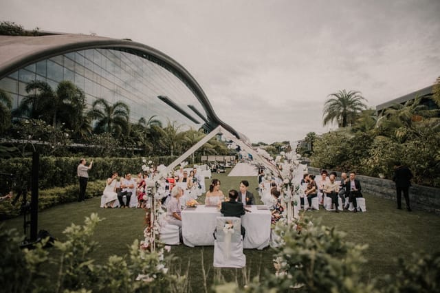 Outdoor wedding ceremony with tented altar at Laguna Ballroom, Dusit Thani Singapore.
