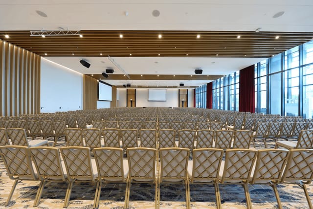 Shaw Foundation Alumni House auditorium with theater seating for conferences and events.