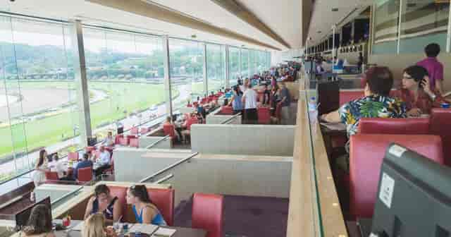 Corporate boxes at Singapore Turf Club, tiered hospitality suite for exclusive event hosting.