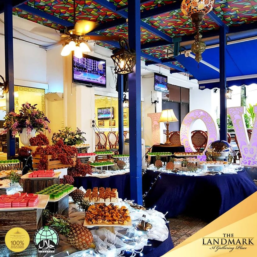 Thematic outdoor buffet at The Landmark with elegant catering displays for social event planning.