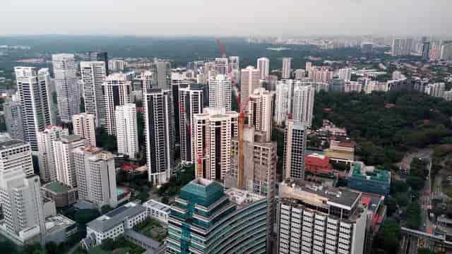 ION Sky observation deck overlooking Singapore urban development and convention hub.