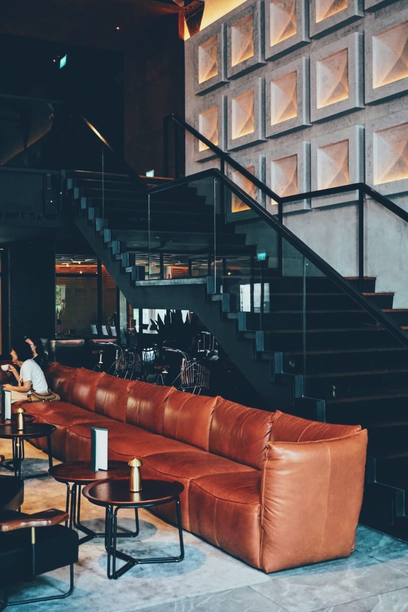 The Lobby Bar at The Warehouse Hotel: multi-level space for networking and client consultations.