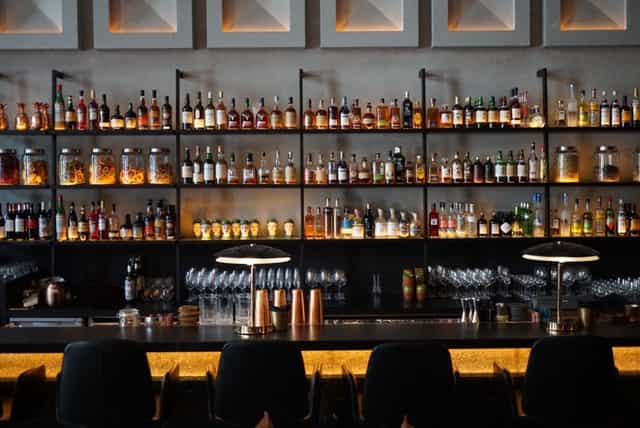 Sophisticated Lobby Bar with premium decor for upscale networking mixers and evening receptions.