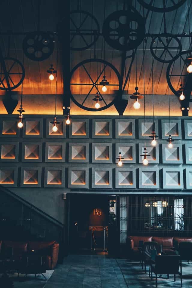 Lobby Bar at The Warehouse Hotel: industrial-chic wall for boutique receptions and event spaces.