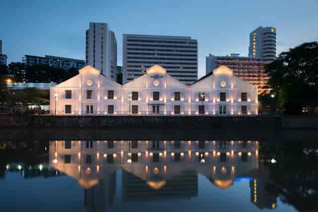 Waterfront restaurant at The Warehouse Hotel with ambient lighting for corporate gala events.