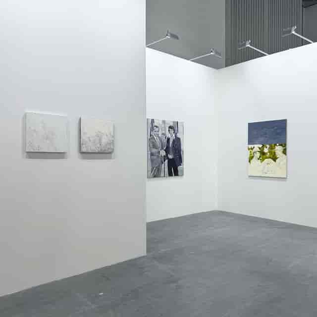 Minimalist exhibition booth at ART SG for high-end art gallery and trade show display.