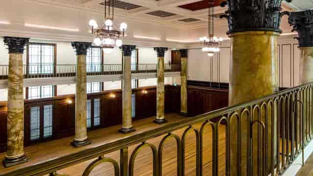 City Hall Chamber event space with marble columns for corporate receptions and elegant galas.
