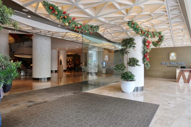 Pan Pacific Orchard lobby entrance, luxury hotel space for event registration and corporate arrivals.