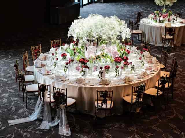 Grand Ballroom gala setup with oversized centerpiece for luxury corporate events and weddings.