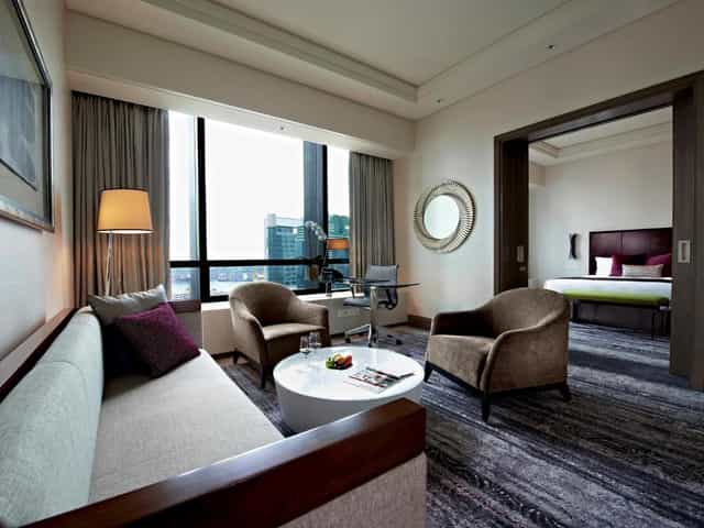 Carlton City Hotel executive suite with workspace for VIP meetings and corporate breakout sessions.