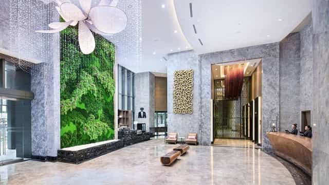 Blackboard at Carlton City Hotel: Contemporary luxury lobby for event registration and VIP arrivals.