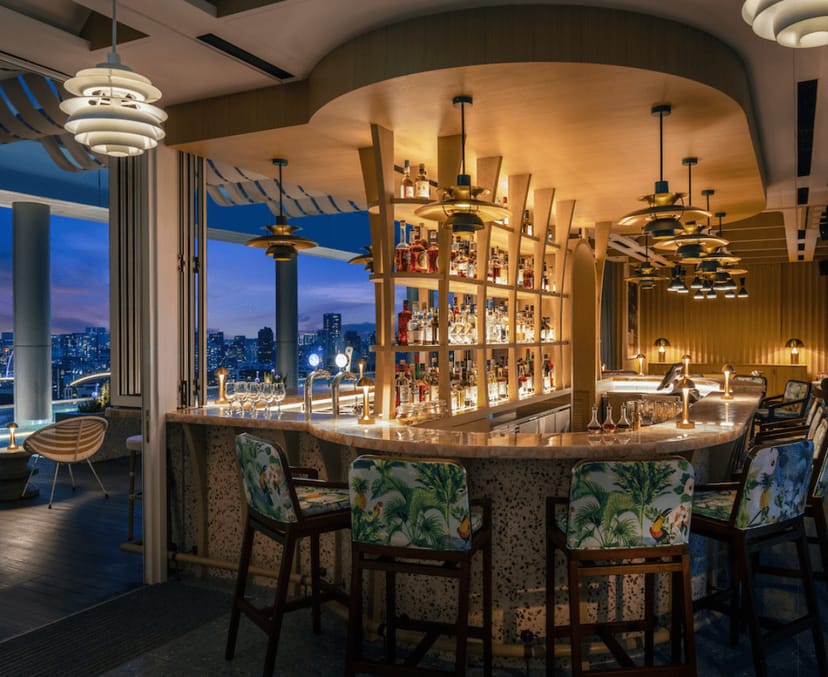 Rooftop bar at ST Signature Tanjong Pagar with skyline view for VIP networking and event reception.