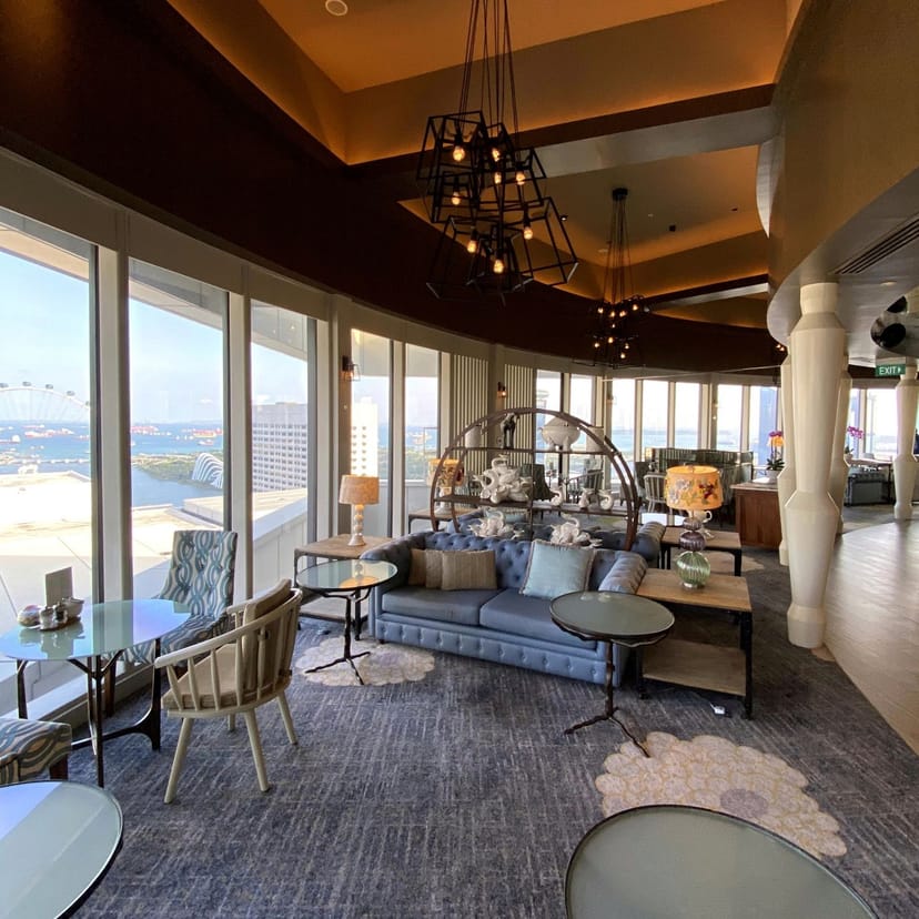 Pacific Club Studio lounge with skyline views for VIP receptions and executive retreats.