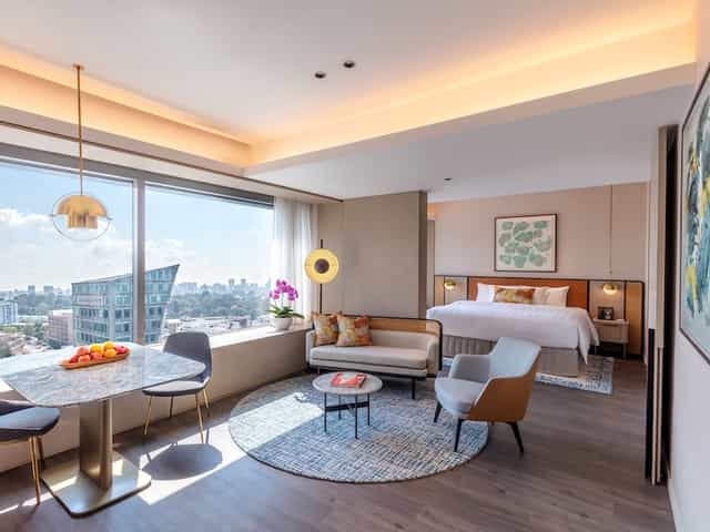 VIP suite at Pan Pacific Orchard, Singapore with skyline view for corporate incentive travel.