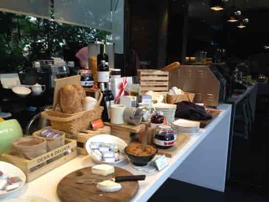 Rustic-chic hotel breakfast buffet station, Quincy Singapore dining experience.