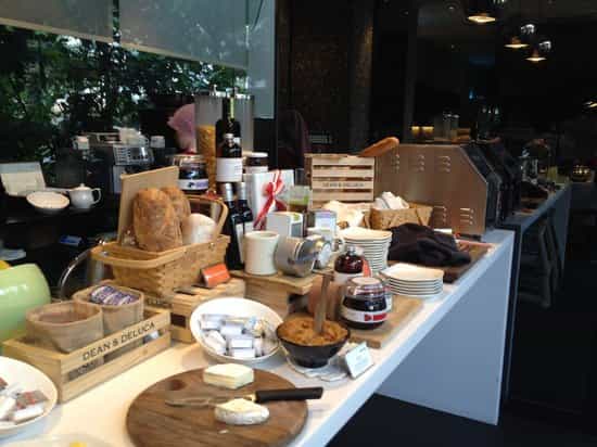 Rustic-chic hotel breakfast buffet station, Quincy Singapore dining experience.