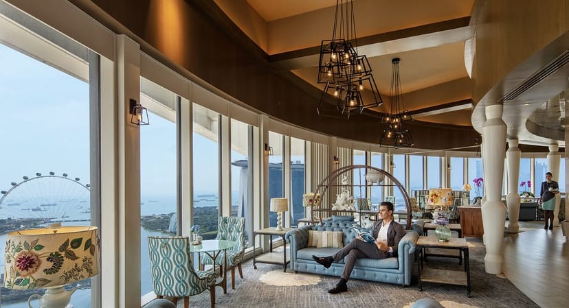 Luxury Quincy Hotel bar with city views, ideal for executive meetings and VIP networking events.