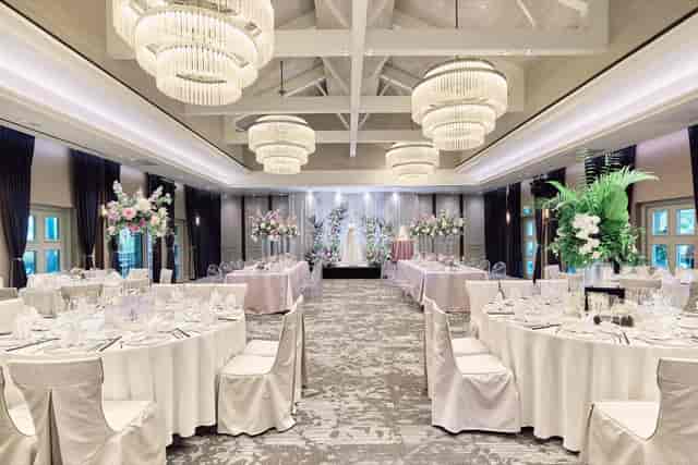 Elegant Oasia Resort Sentosa ballroom with chandeliers for luxury weddings and gala events.