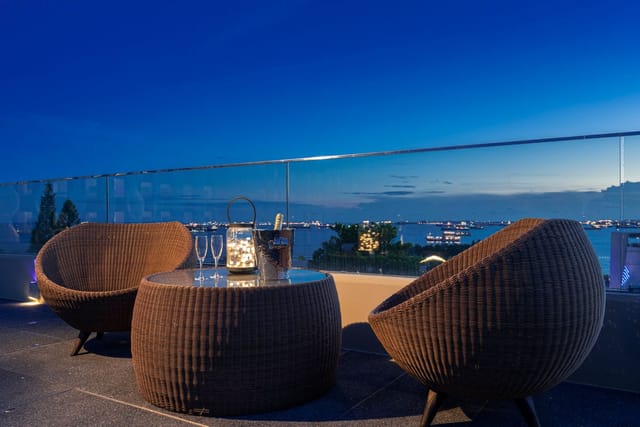 Oasia Resort Sentosa VIP breakout space with rattan furniture for corporate events and receptions.