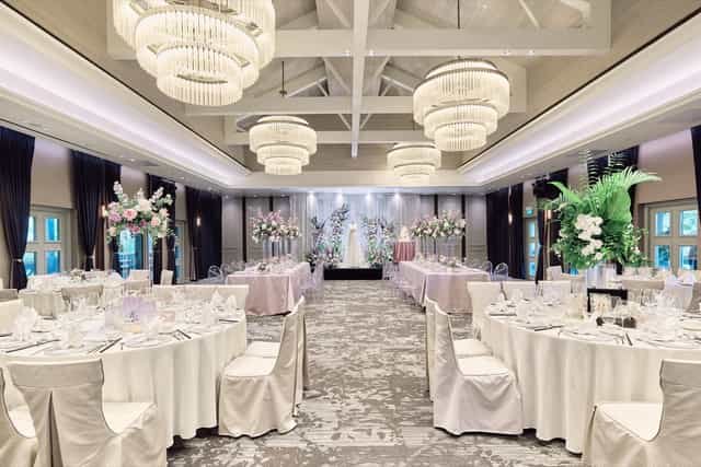 Oasia Resort Sentosa ballroom with chandelier lighting for premium wedding or upscale gala.