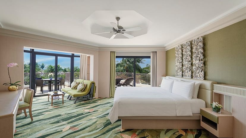 Raffles Sentosa Garden Room: luxury executive suite with private balcony for VIP strategy sessions.