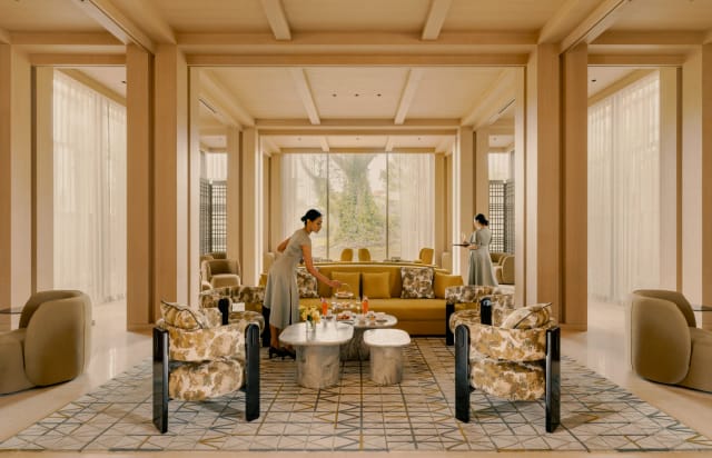 Luxury VIP meeting space at Raffles Sentosa with plush seating for exclusive corporate events.