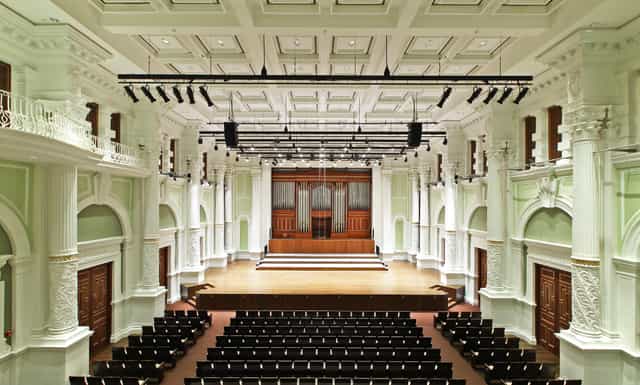 Victoria Concert Hall with stage and seating, ideal for corporate galas and keynote events.