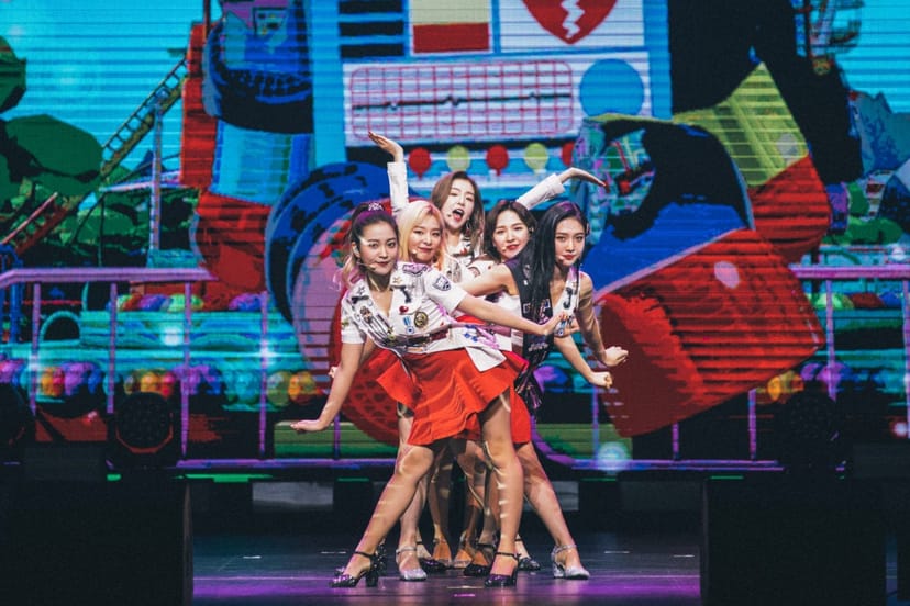 Sapphire in Red Velvet stage performance with LED backdrop for live concert event photography.