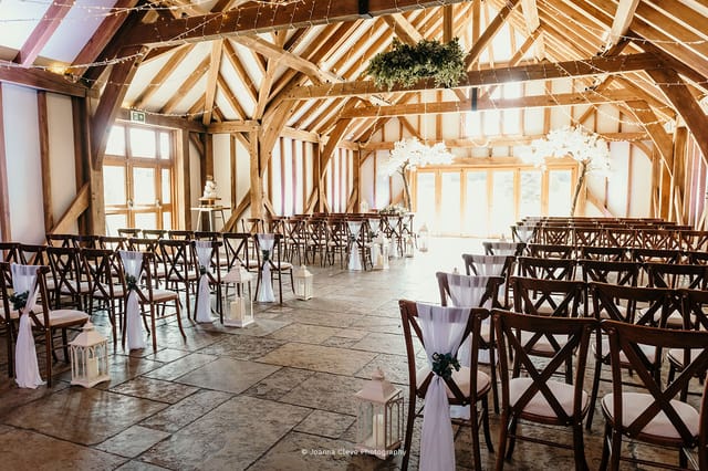 Charming Brookfield Barn event space with wooden beams, perfect for weddings and gatherings.