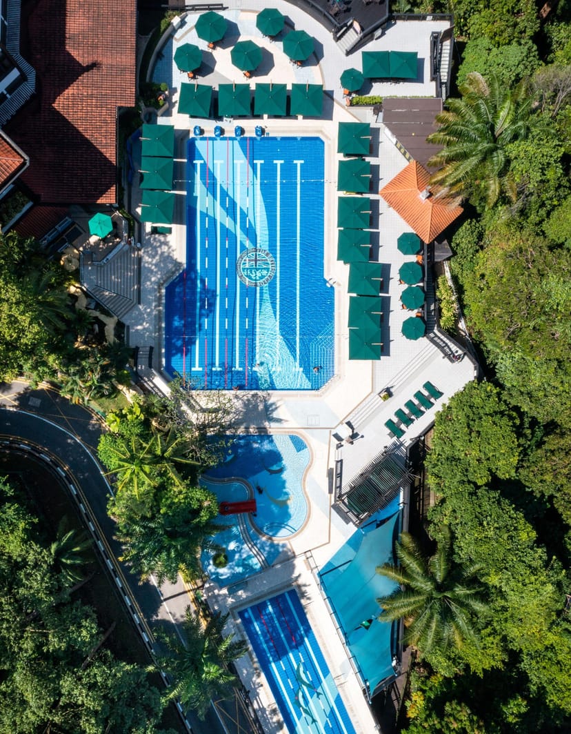 Verandah Terrace poolside seating for corporate retreats and team-building networking events.